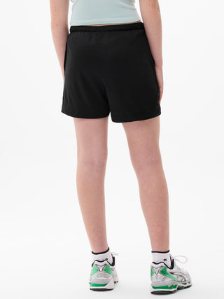 Pantalón corto de malla de 4" para niña Gamechanger de Athleta.