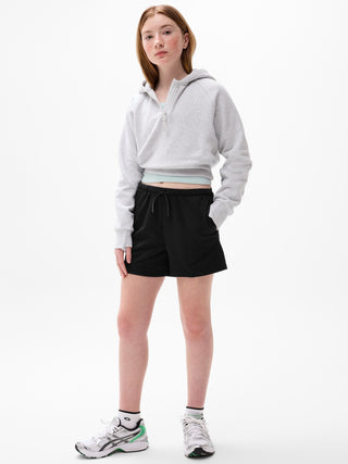 Pantalón corto de malla de 4" para niña Gamechanger de Athleta.