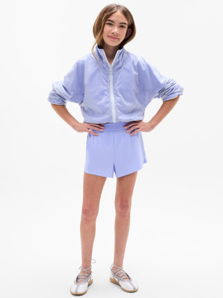 Cortavientos de malla reversible para niña Athleta.