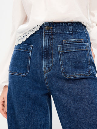 Jeans anchos con puños y cintura muy alta.
