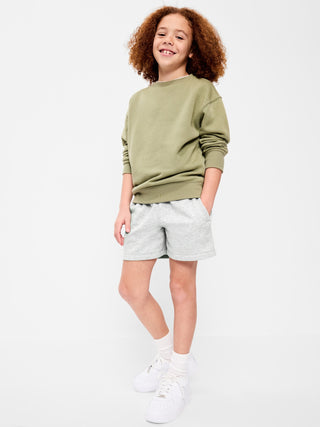 Shorts deportivos de polar por encima de la rodilla favoritos para niños.