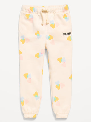 Pantalones deportivos tipo jogger con logo estampado para niñas pequeñas.