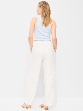 Pantalones anchos en mezcla de lino con talle alto.