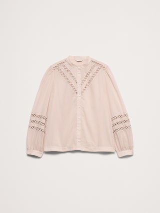 Blusa de encaje con inserción de algodón.