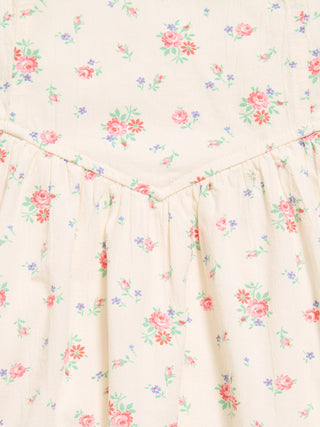 Vestido estampado sin mangas y con vuelo para niñas.