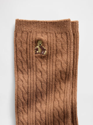 Calcetines de punto trenzado con osito Brannan.
