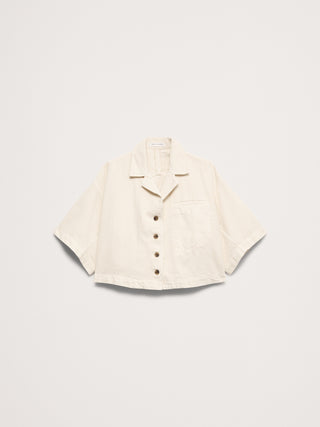 Camisa vaquera corta cuadrada.