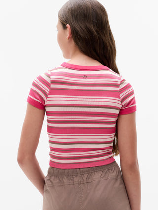 Camiseta de cuello alto para niña Athleta Rise Above.