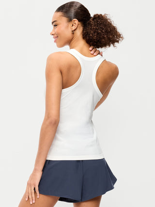 Camiseta sin mangas fluida con espalda cruzada ajustada y sin costuras.