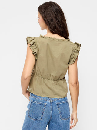 Top bordado con mangas onduladas.