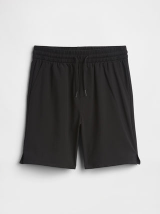 Shorts deportivos relajados y sin cordones para niños.