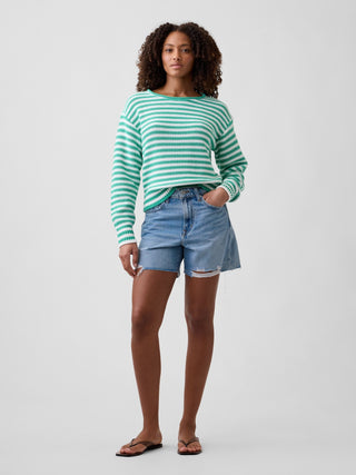 Jersey holgado con cuello vuelto y rayas.