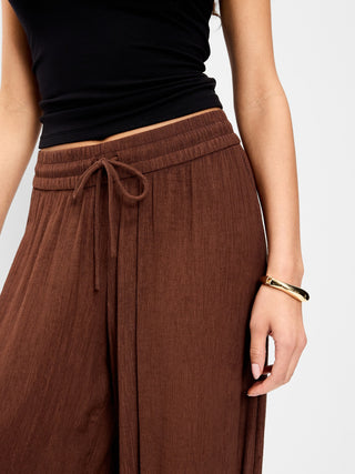 Pantalones harén de gasa arrugada de cintura alta.