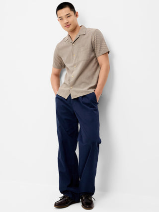 Camisa Camp de manga corta a rayas.