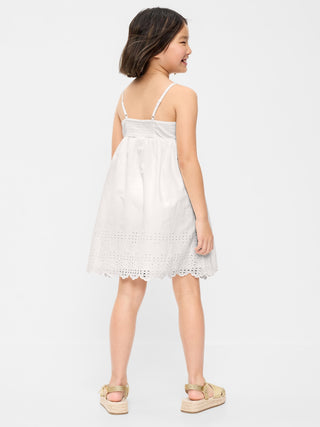 Vestido ajustado y con vuelo sin mangas para niñas.
