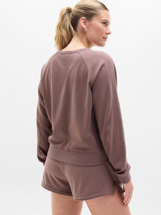 Sudadera aireada de felpa de algodón con cuello redondo.
