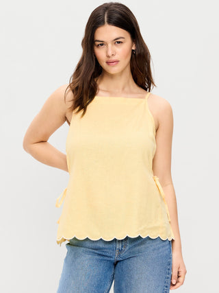 Camiseta sin mangas con delantal y lazo lateral.