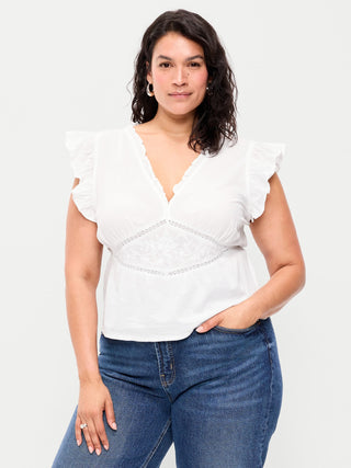 Top bordado con mangas onduladas.