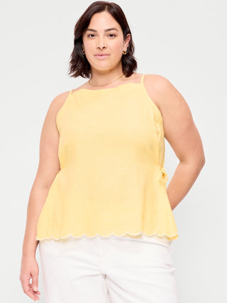 Camiseta sin mangas con delantal y lazo lateral.