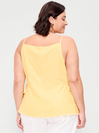 Camiseta sin mangas con delantal y lazo lateral.