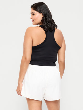 Top corto ajustado sin costuras con cuello alto.