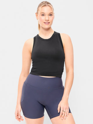 Top corto ajustado sin costuras con cuello alto.