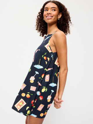 Vestido recto mini en mezcla de lino con cuello delantal.