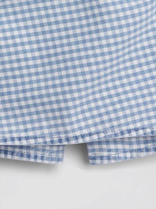 Minifalda-pantalón de mezclilla con frente cruzado de cuadros para niños.