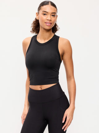Top corto ajustado sin costuras con cuello alto.