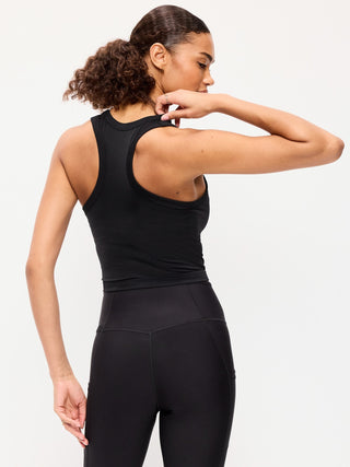 Top corto ajustado sin costuras con cuello alto.