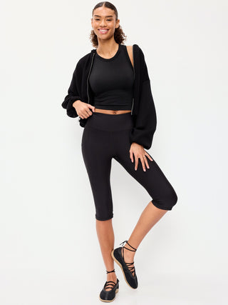 Top corto ajustado sin costuras con cuello alto.