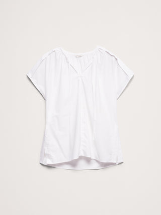Túnica de popelina de algodón con cuello dividido.