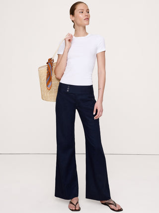 Pantalón ancho de lino y viscosa elástico de talle bajo.