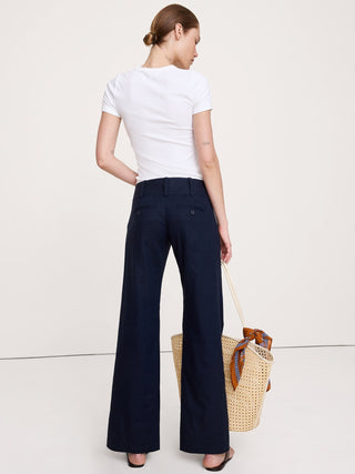 Pantalón ancho de lino y viscosa elástico de talle bajo.