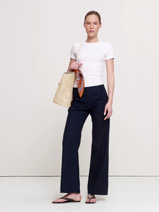 Pantalón ancho de lino y viscosa elástico de talle bajo.
