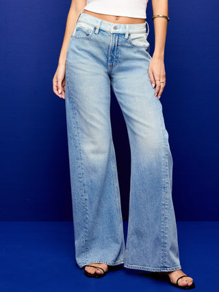 Mid-Rise Twisted-Seam Flare Jeans.