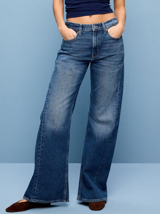 Mid-Rise Twisted-Seam Flare Jeans.