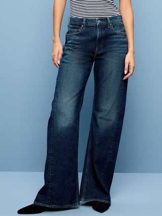 Mid-Rise Twisted-Seam Flare Jeans.