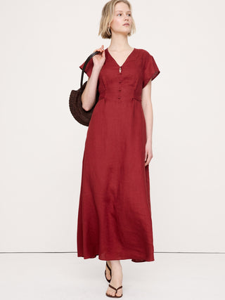 Vestido largo de lino con lazo lateral.