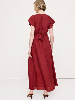 Vestido largo de lino con lazo lateral.