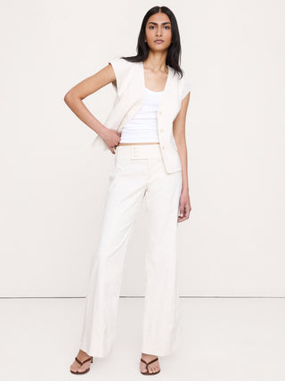 Pantalón ancho de lino y viscosa elástico de talle bajo.