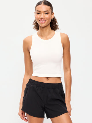 Top corto ajustado sin costuras con cuello alto.