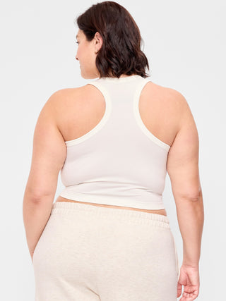 Top corto ajustado sin costuras con cuello alto.