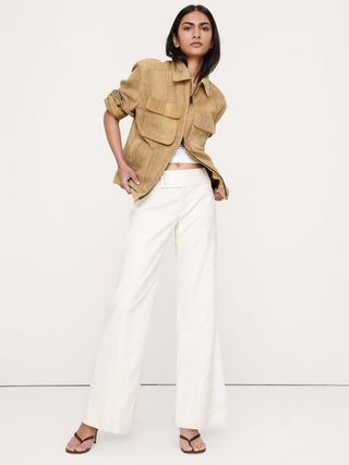 Pantalón ancho de lino y viscosa elástico de talle bajo.
