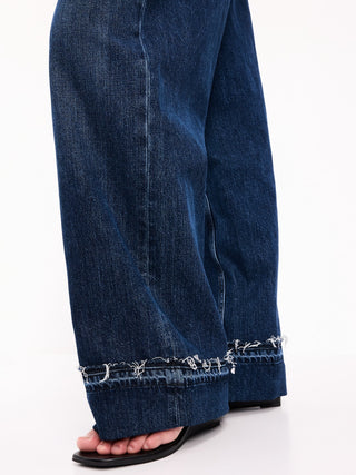 Jeans de tiro bajo, holgados y de pierna ancha.