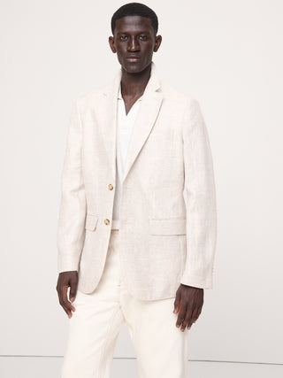Chaqueta de traje entallada de lino con diseño de espiguilla.
