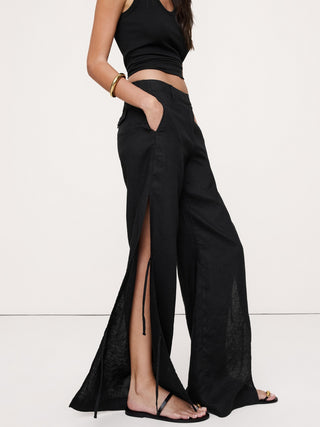 Pantalón ancho de lino con lazo lateral The Studio.