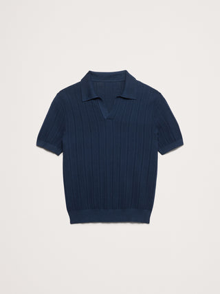 Polo tipo jersey de algodón texturizado a rayas.