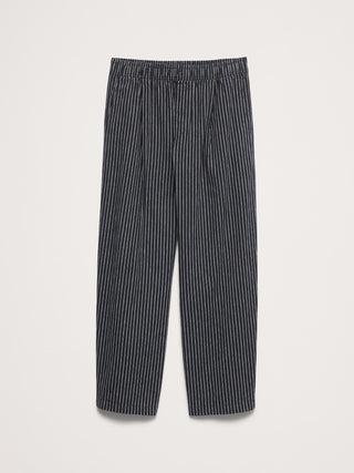 Pantalón relajado sin cierres plisado de lino y algodón.