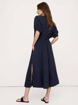 Vestido midi de sarga de algodón con mangas abullonadas.